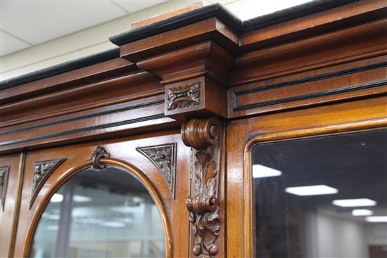 A Victorian ebony banded oak breakfront library bookcase, W.10ft D.1ft 9in. H.7ft 3in.